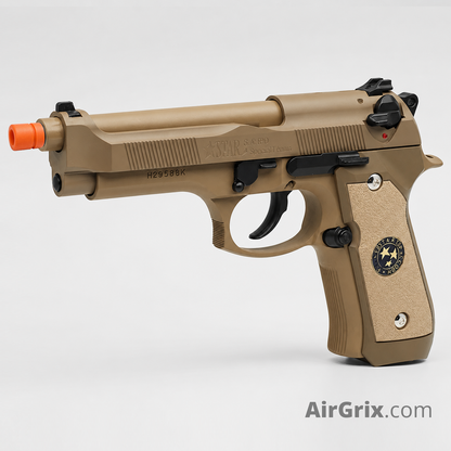 WE M9 Biohazard 20th Anniversary Tan GBB Pistol, left side three-quarter studio view with STAR S.A.PD slide engraving